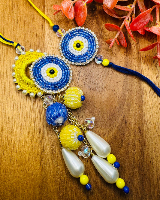 Blue And Yellow Evil Eye Bhaiya And Bhabhi Rakhi Set