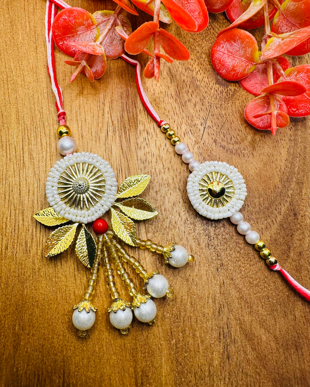 Chakri Motif Bhaiya Bhabhi Rakhi Set (White)