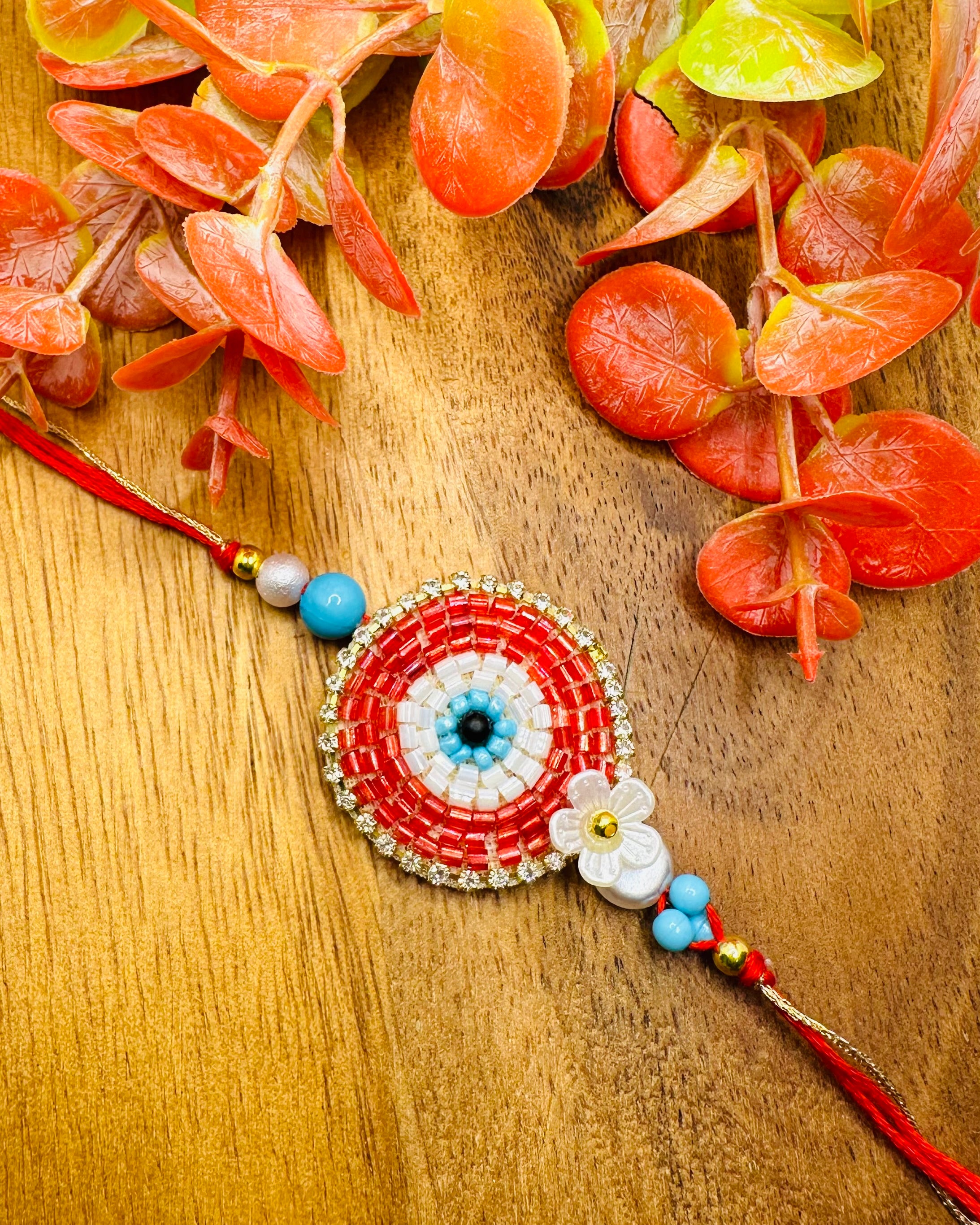 Red Evil Eye Bhaiya Bhabhi Rakhi Set