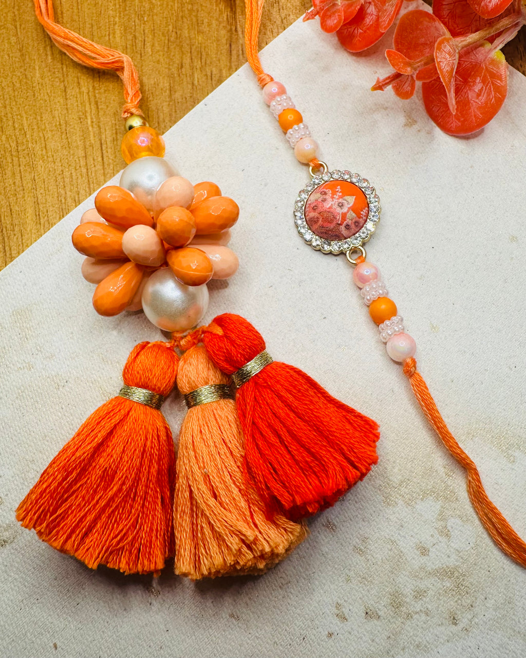 Orange Ombre Beads Bhaiya And Bhabh Rakhi Set