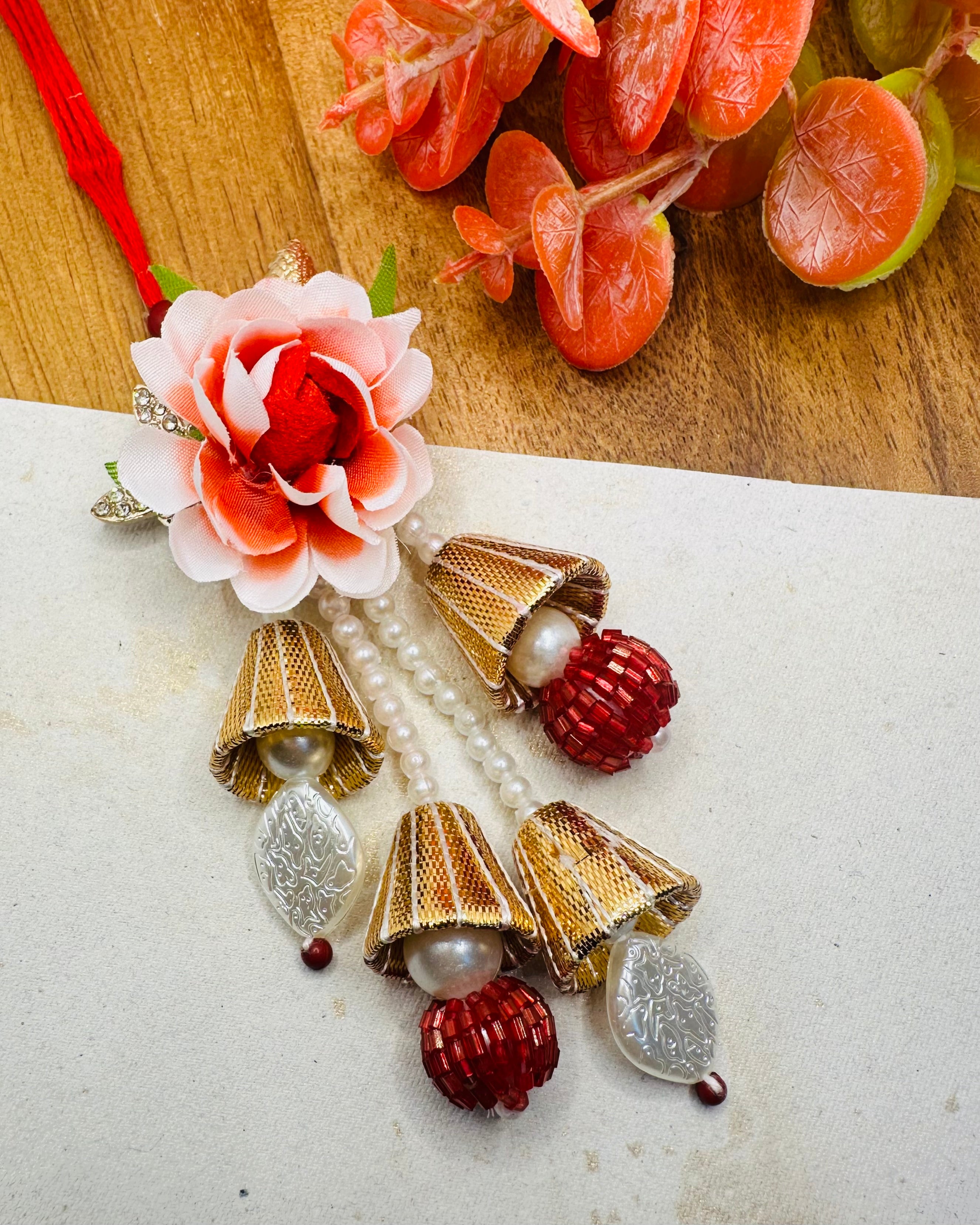 White And Red Floral Bhaiya Bhabhi Rakhi Set