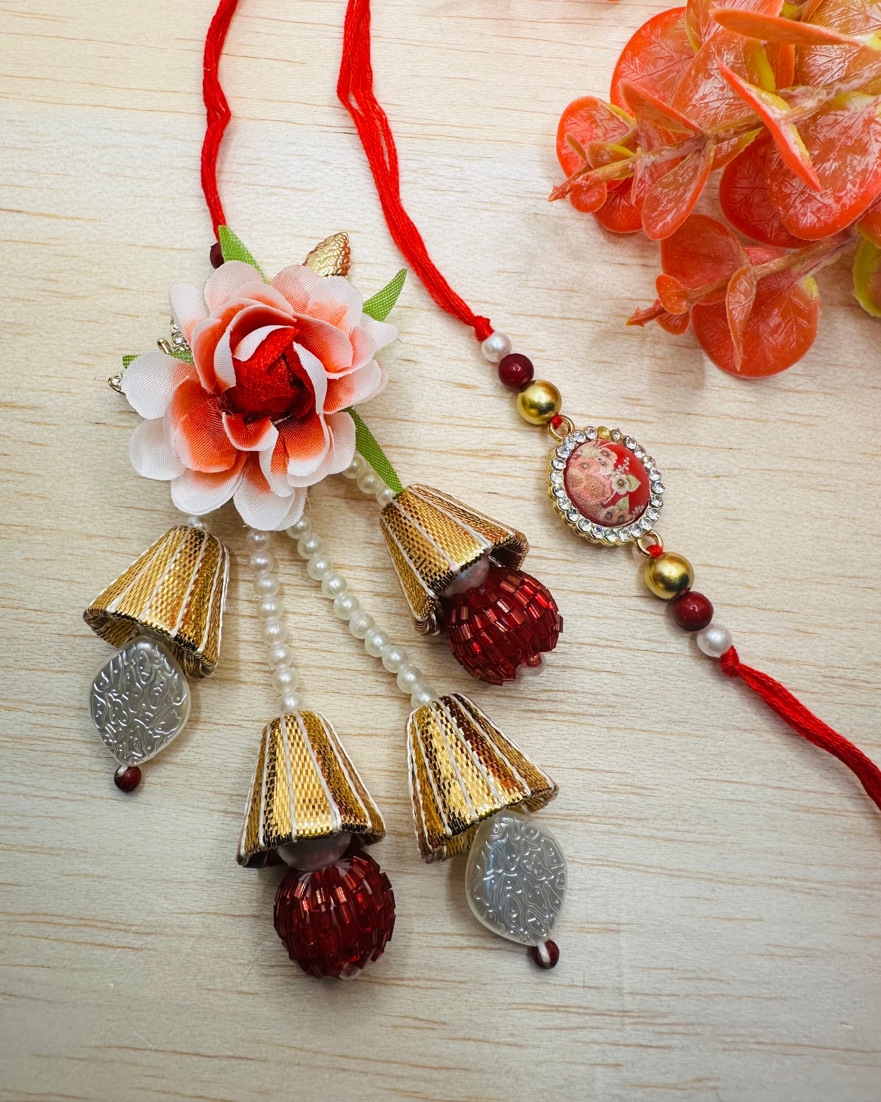 White And Red Floral Bhaiya Bhabhi Rakhi Set