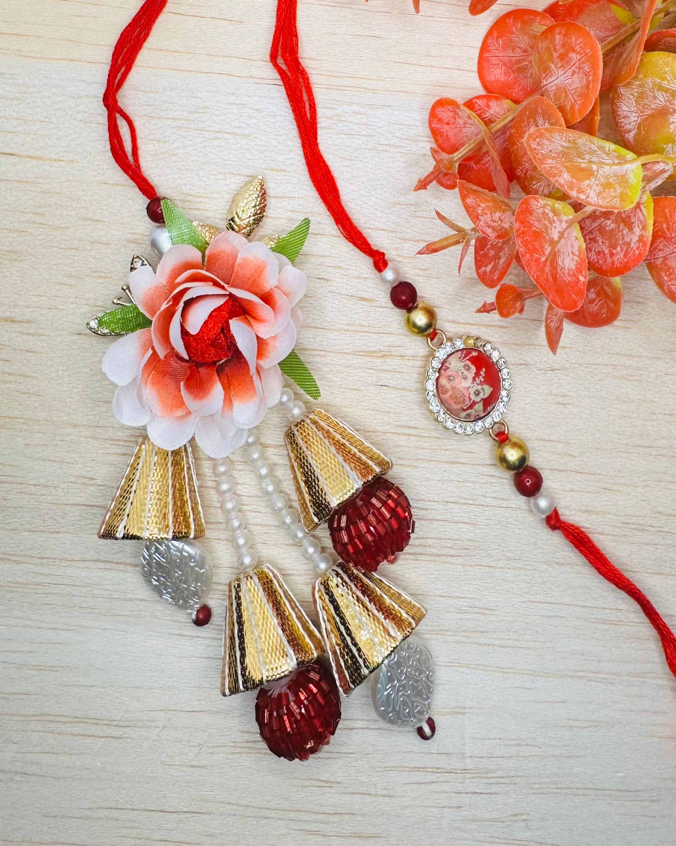 White And Red Floral Bhaiya Bhabhi Rakhi Set