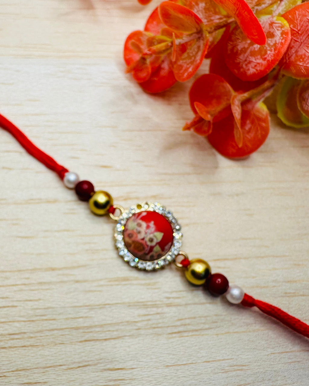White And Red Floral Bhaiya Bhabhi Rakhi Set