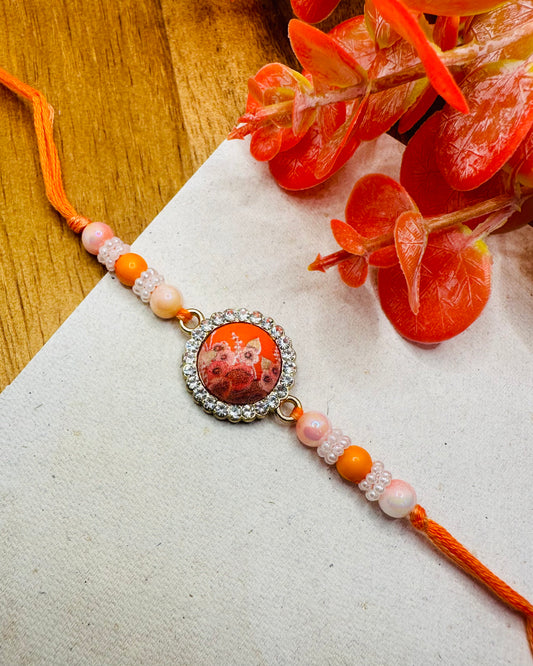 Orange Designer Stone Rakhi