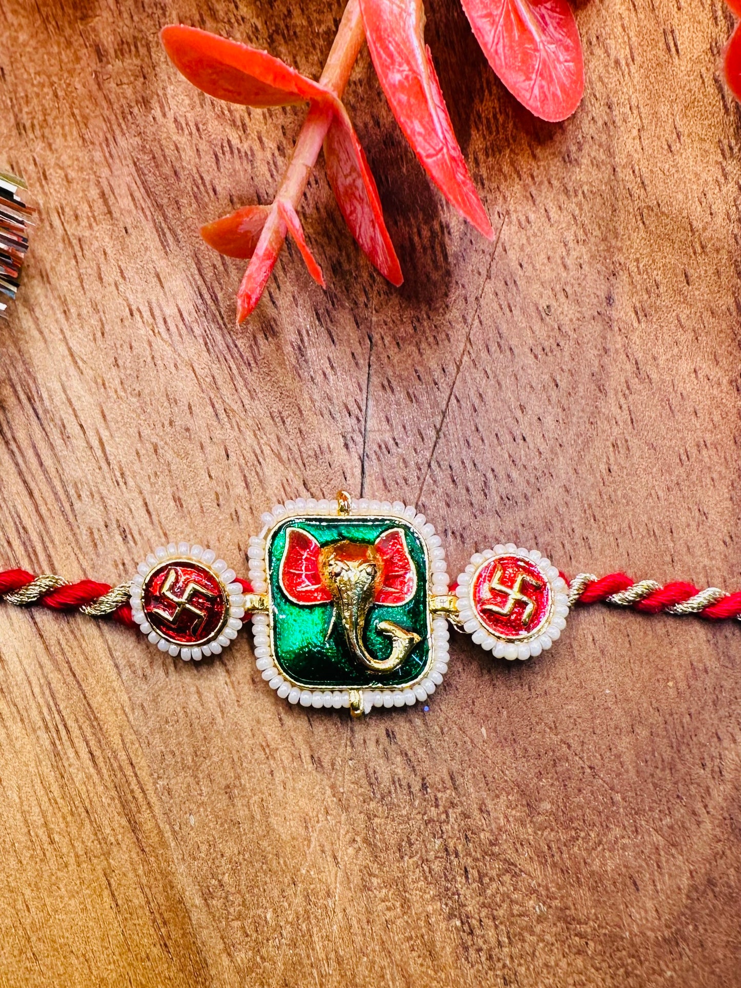 Ganesha And Swastik Premium Rakhi