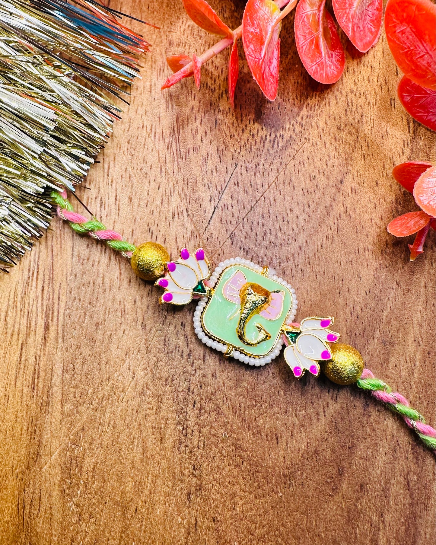 Premium Ganesha Rakhi With Lotus Details