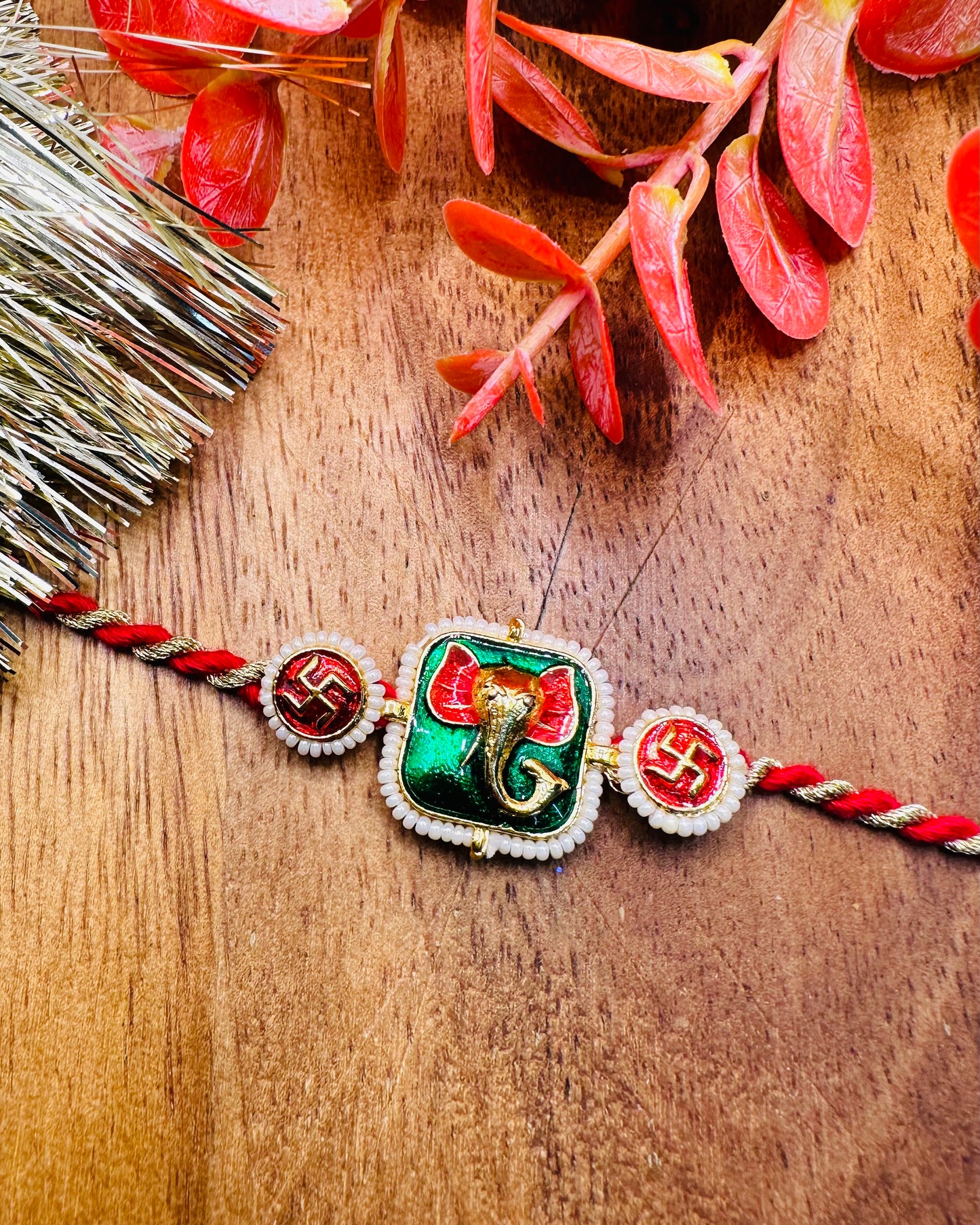 Ganesha And Swastik Premium Rakhi