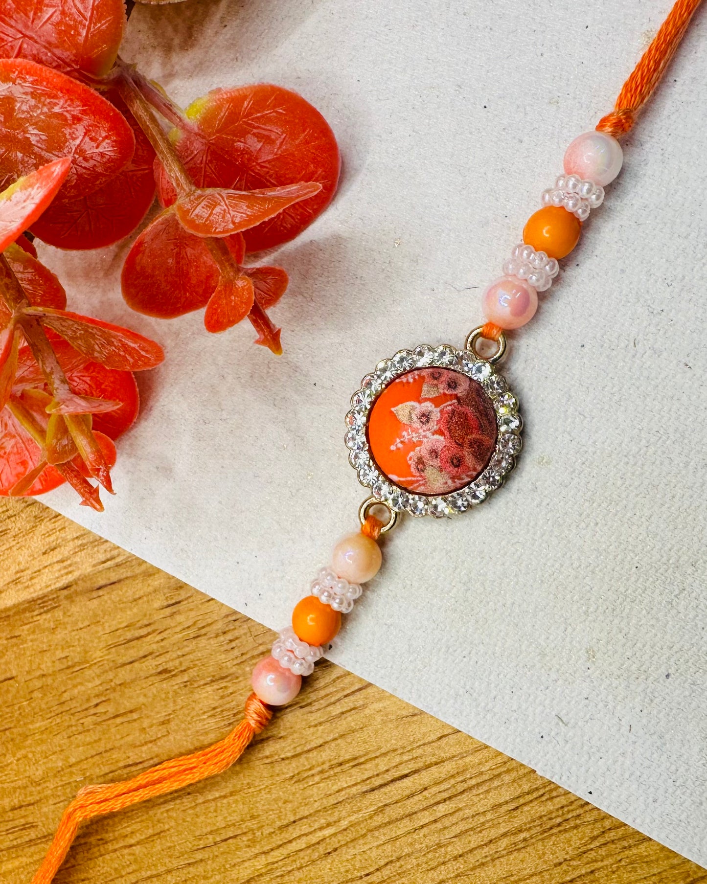Orange Designer Stone Rakhi