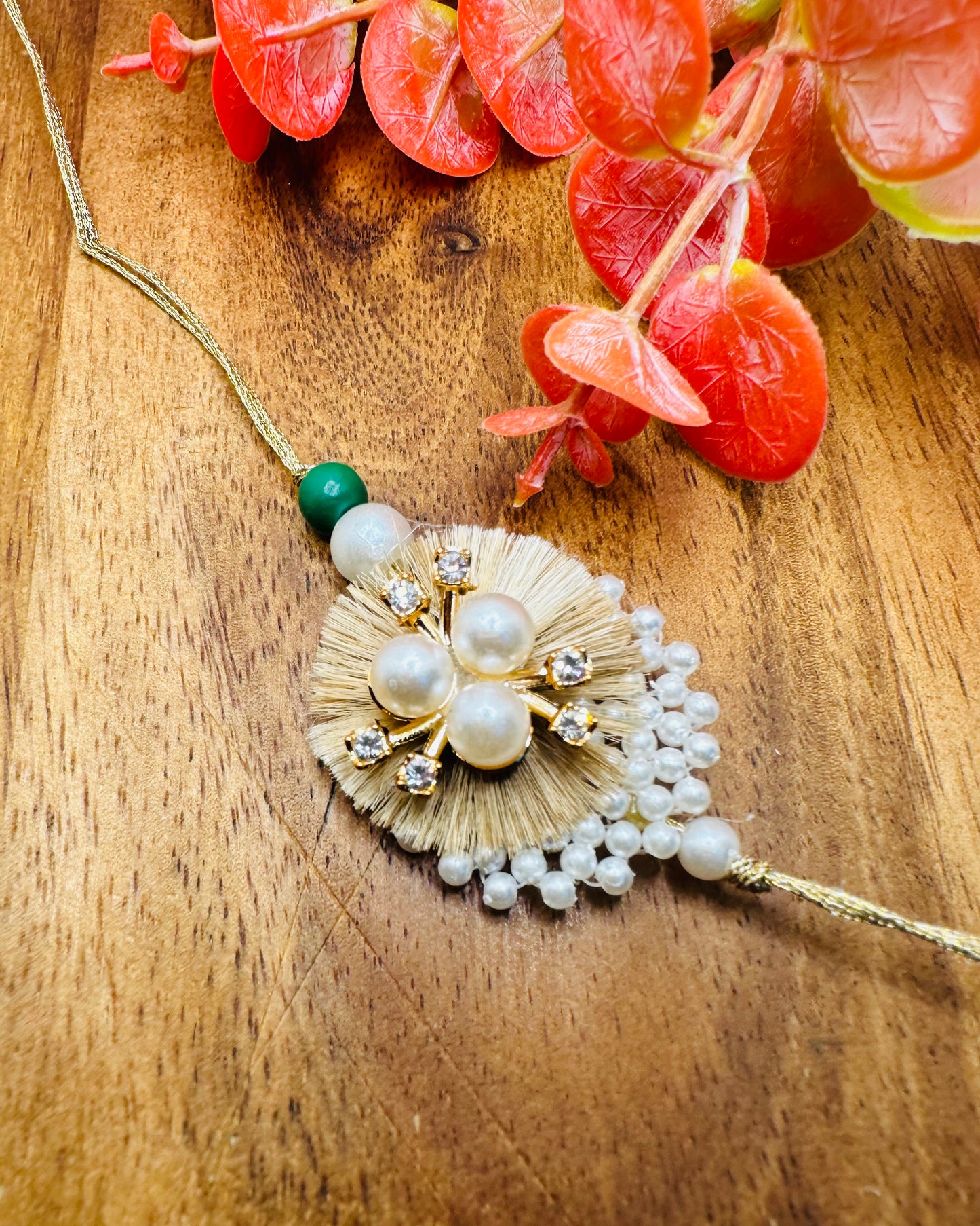 Pearl Base and Resham Chakalia Rakhi (Golden)