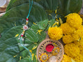 OM WITH MOTHER OF PEARL RAKHI