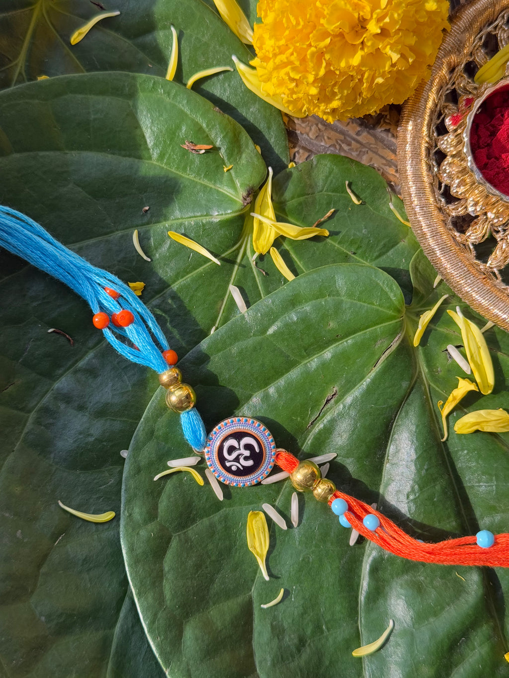 OM RAKHI